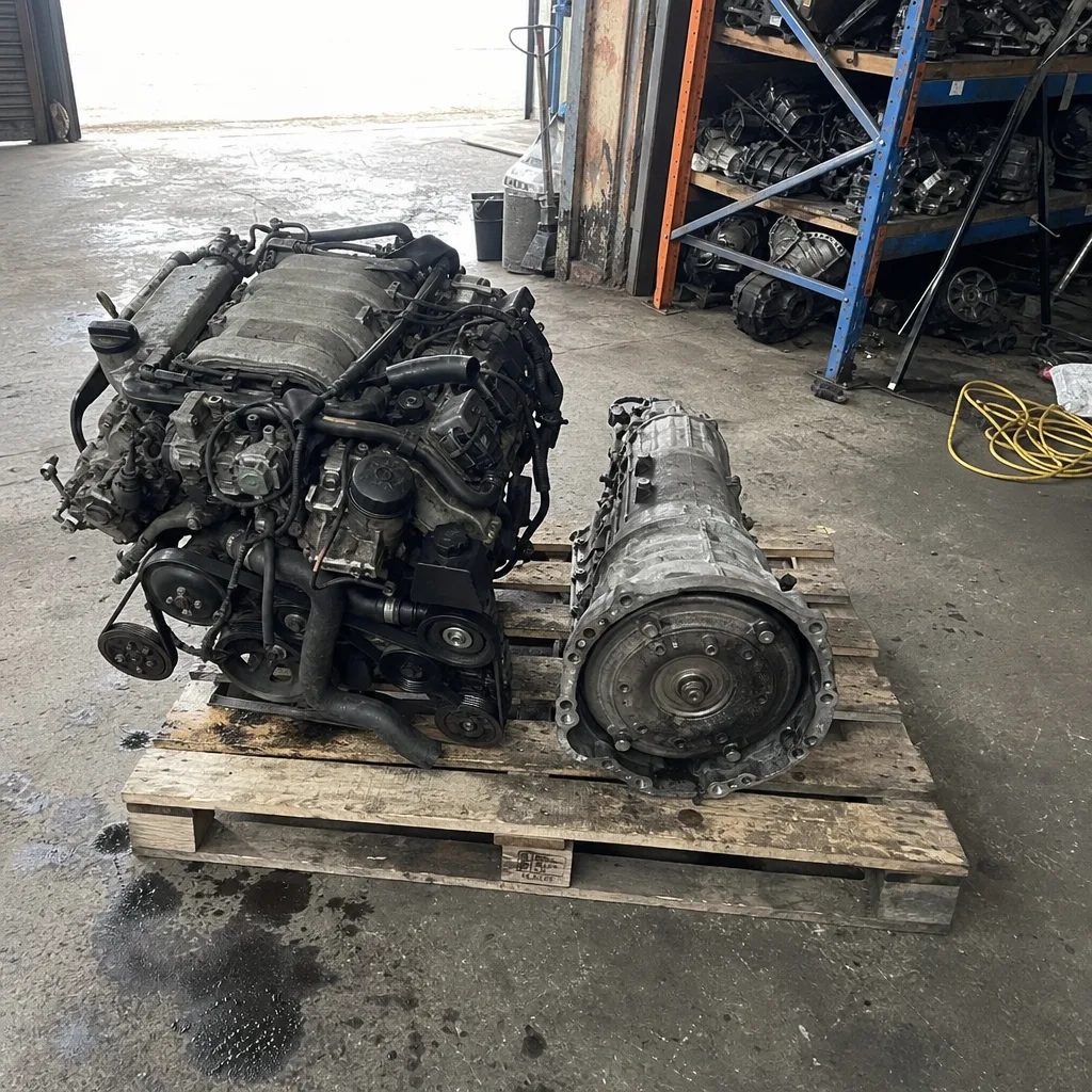 Mercedes-Benz diesel engine and matched automatic gearbox on a wooden workshop pallet